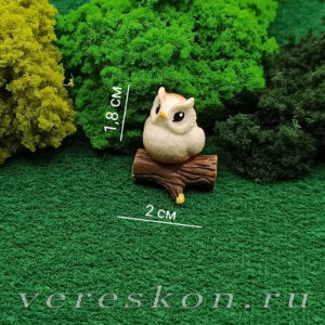 Совёнок, маленькое брёвнышко